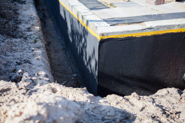 Professional Interior Drainage System technician working in Buena, NJ